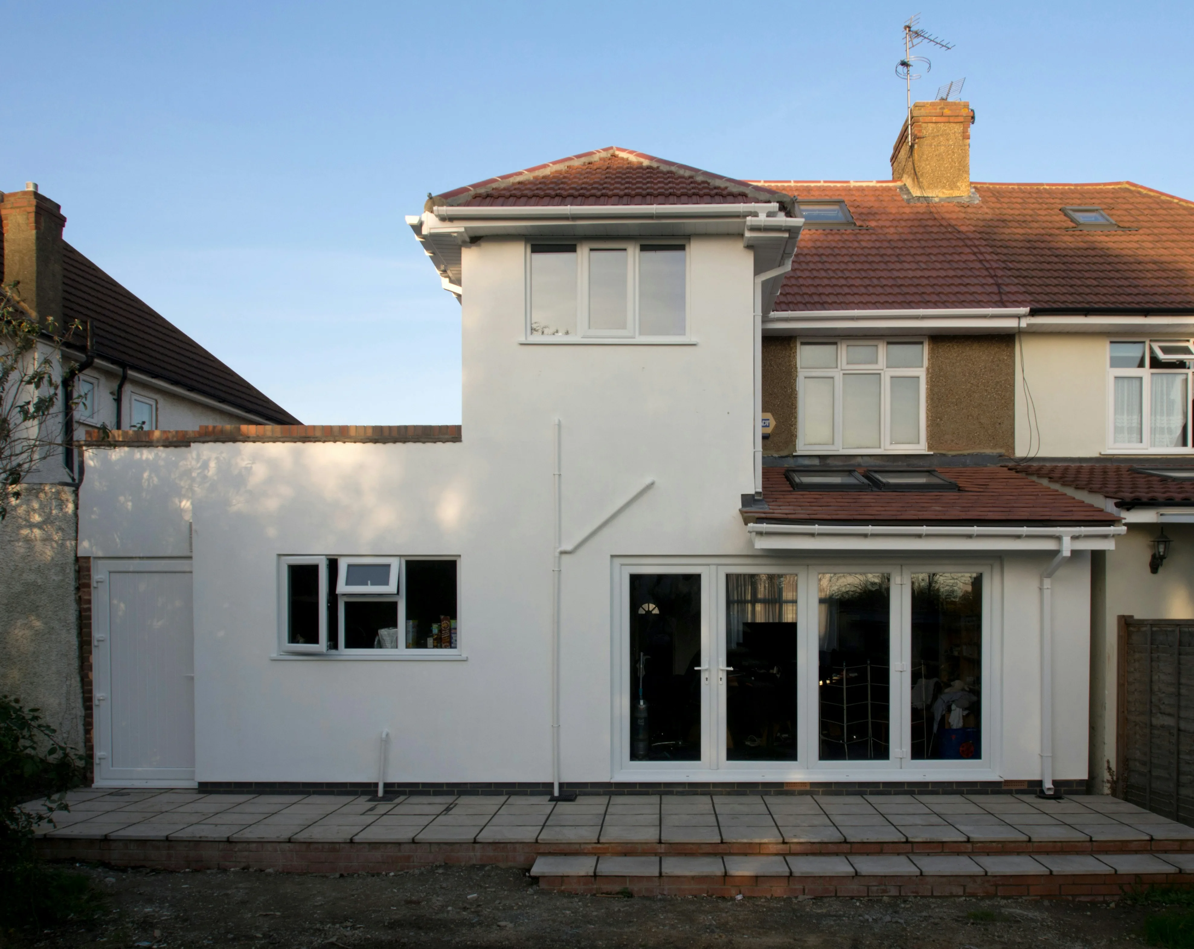 Contemporary home extension with large windows and modern detailing